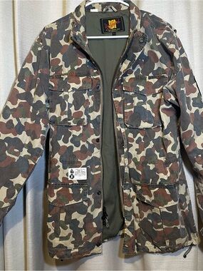 UNDEFEATED “Play Dirty” camo utility/military-style jacket, size L